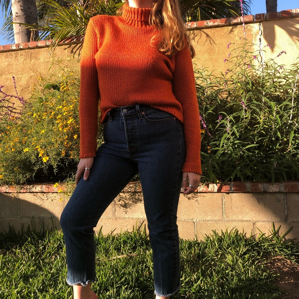Orange knit turtle neck